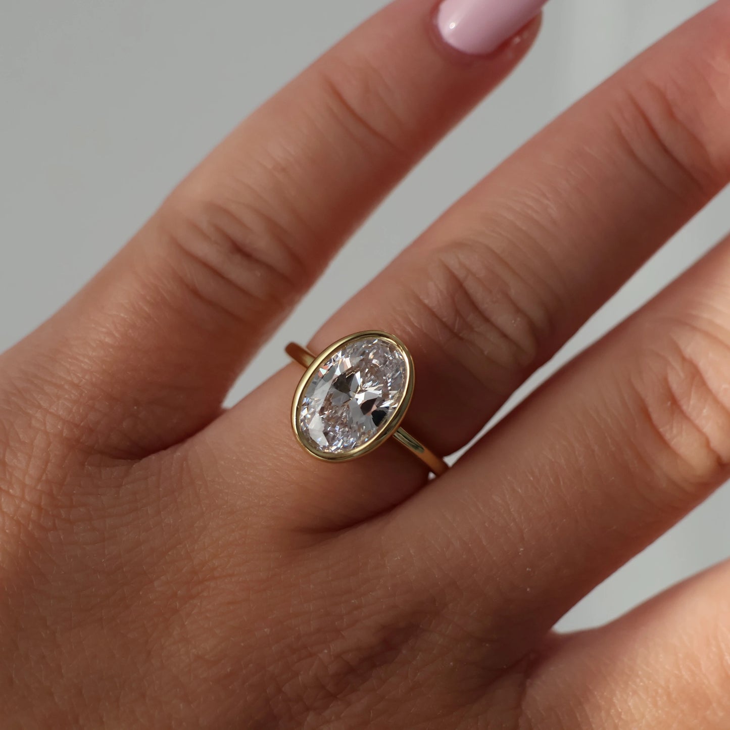 14K gold plated 3.5 carat oval solitaire bezel set ring