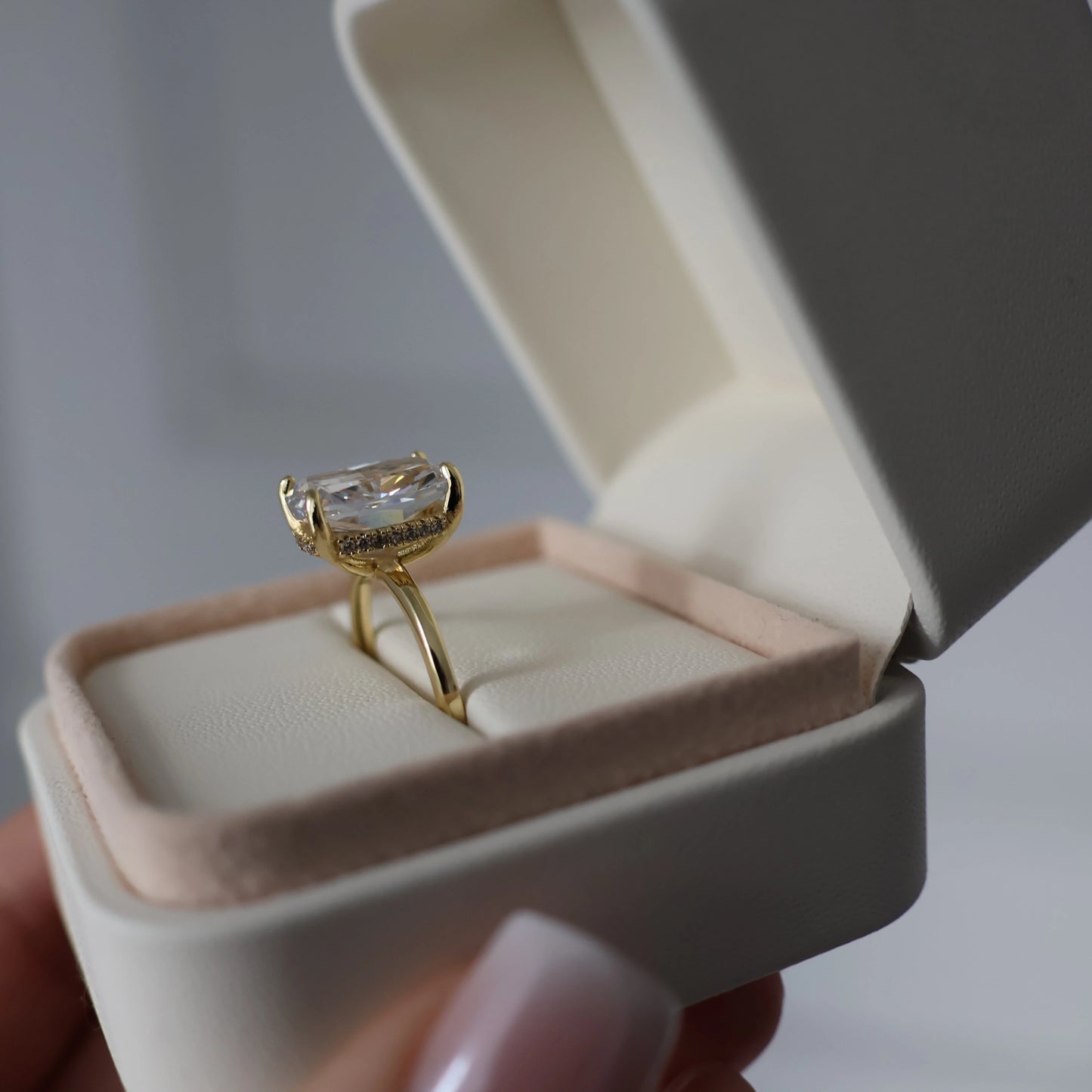 14K gold plated cubic zirconia engagement ring with a 3.5 carat elongated cushion cut stone