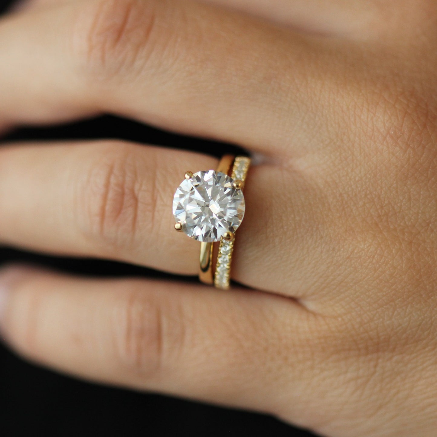 3ct round ring and 14k half eternity band on hand