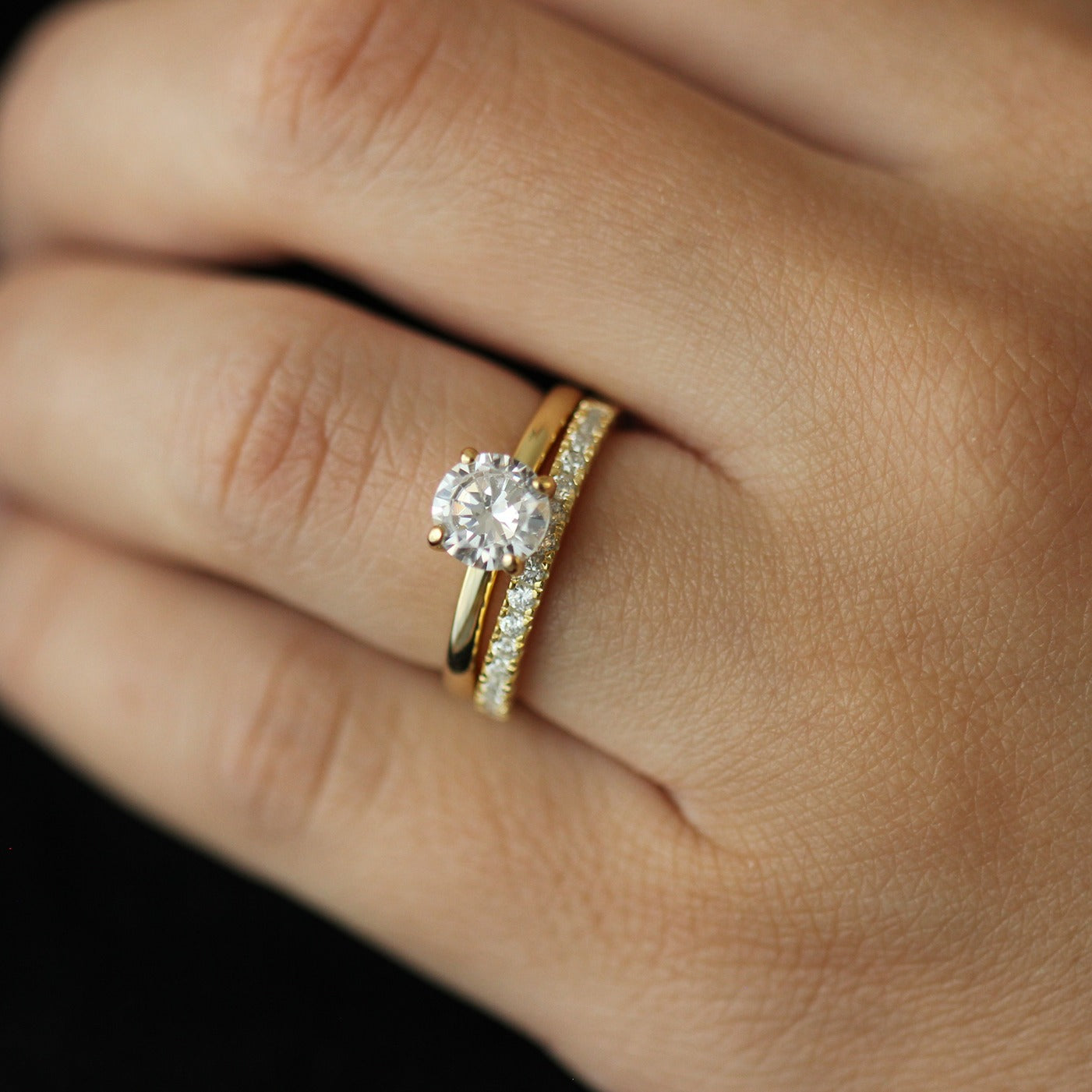 1ct round ring and 14k half eternity gold band on hand