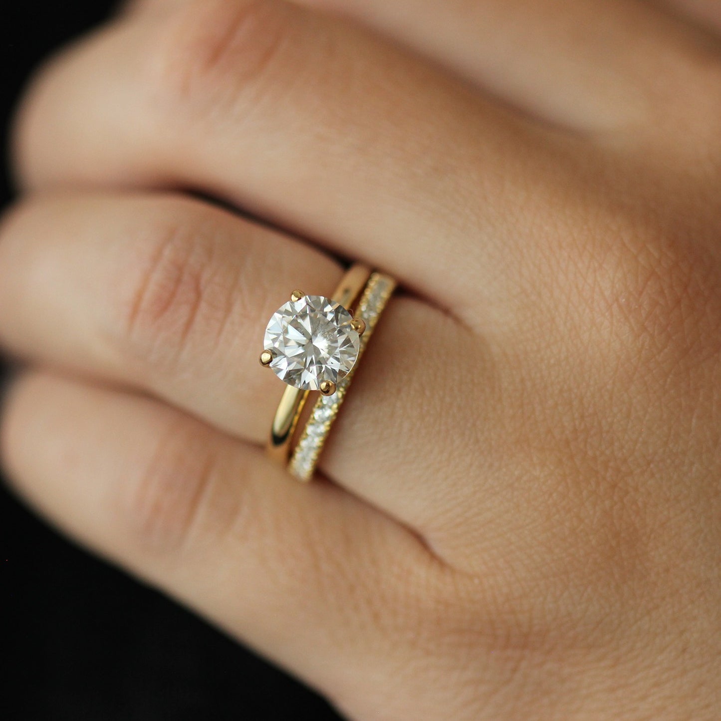 2ct round ring and 14k half eternity gold band on hand