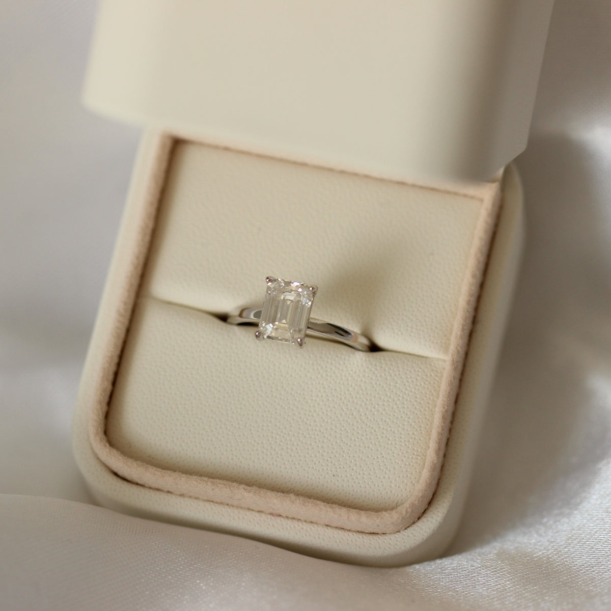 2 carat emerald solitaire moissanite engagement ring