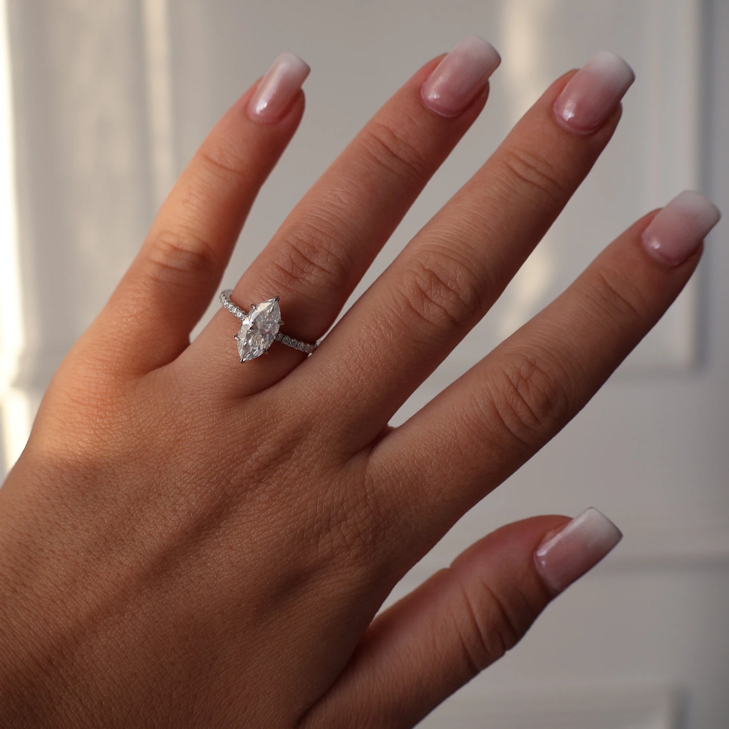 2 carat marquise moissanite ring with pavé setting in silver
