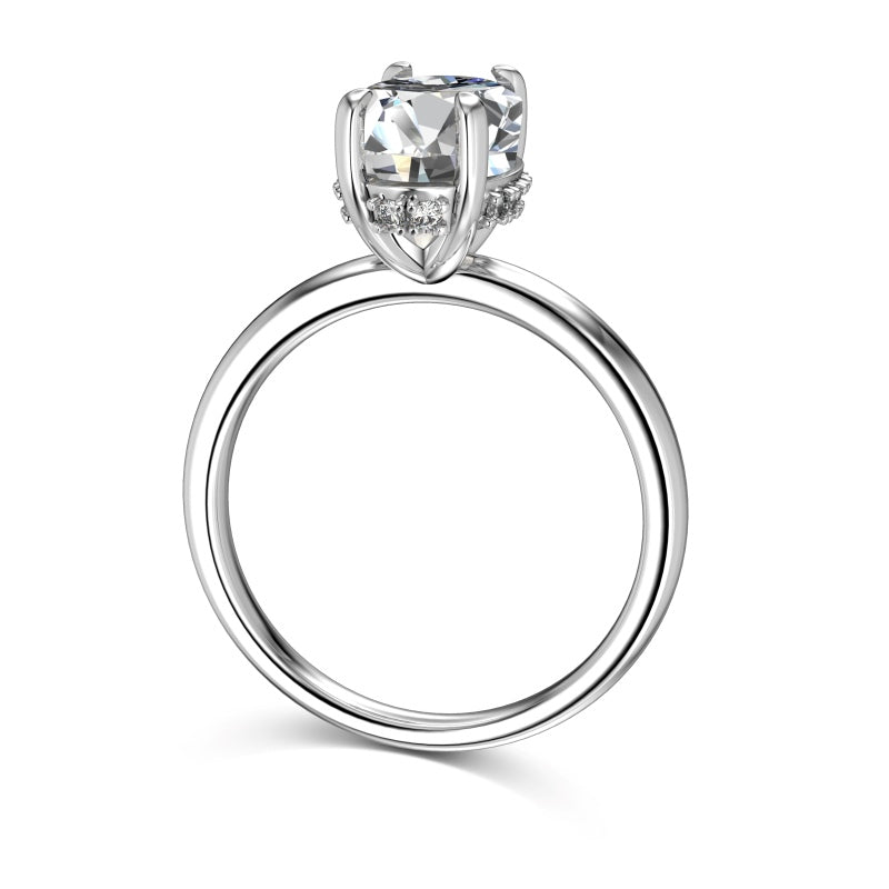 Side profile of 2 carat silver oval ring with hidden halo