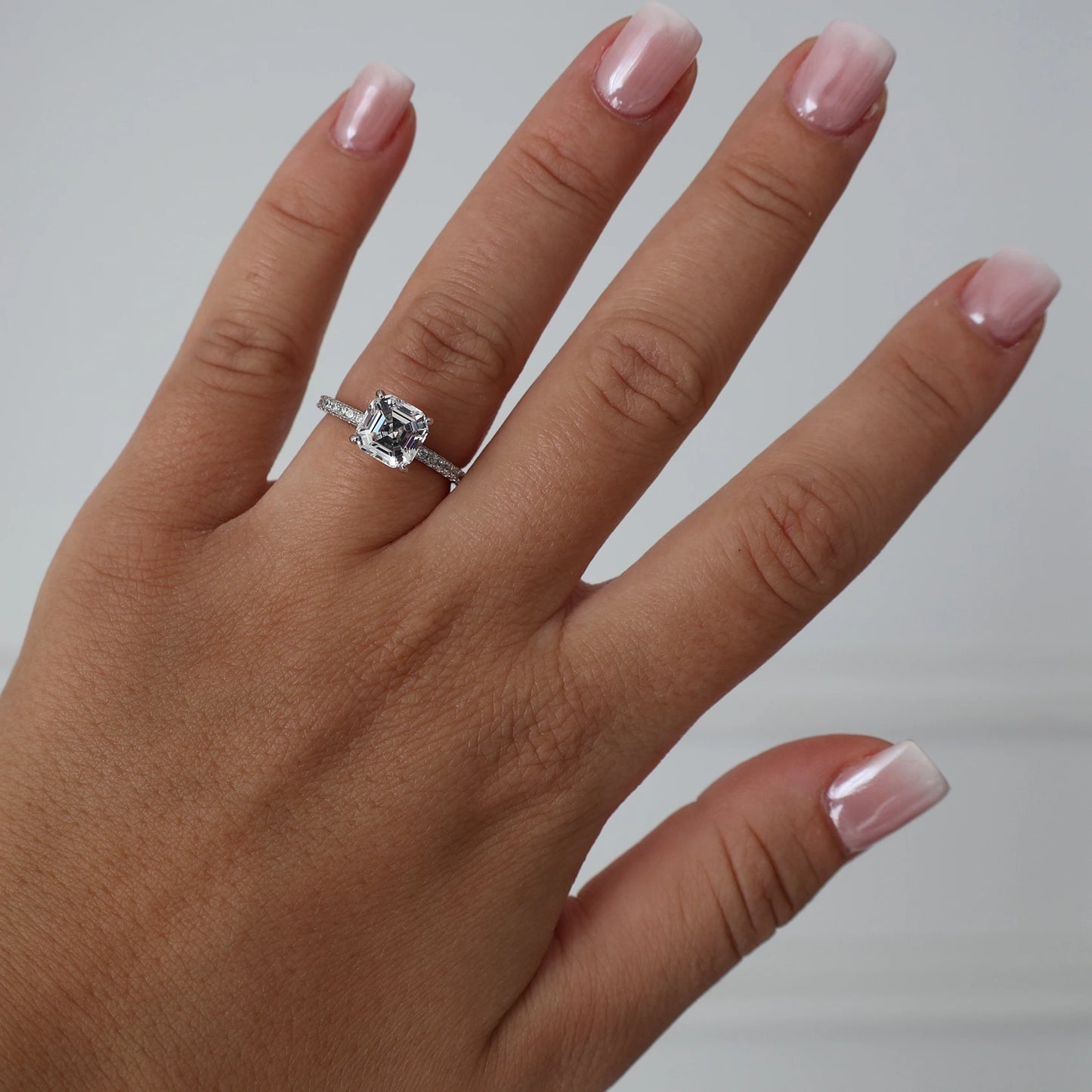 2 ct asscher cut cubic zirconia engagement ring with a silver pavé band