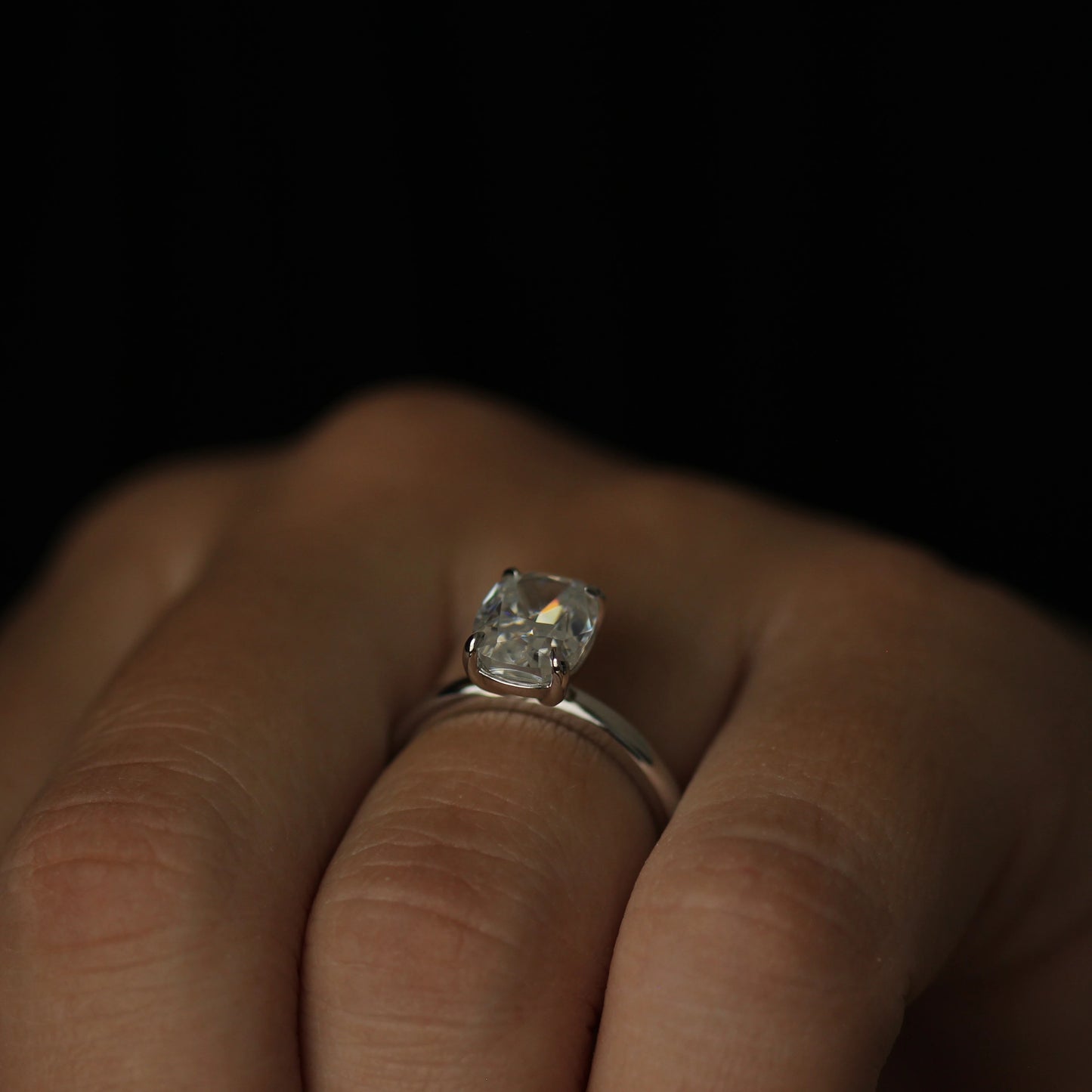 front view of 3 carat elongated cushion moissanite solitaire ring silver
