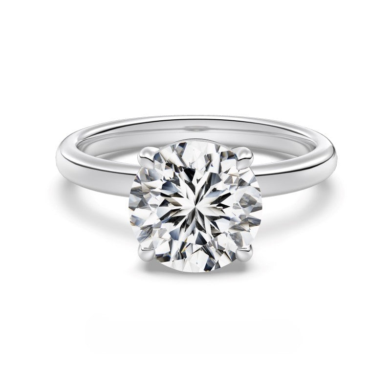 3 carat round cut silver ring on white background