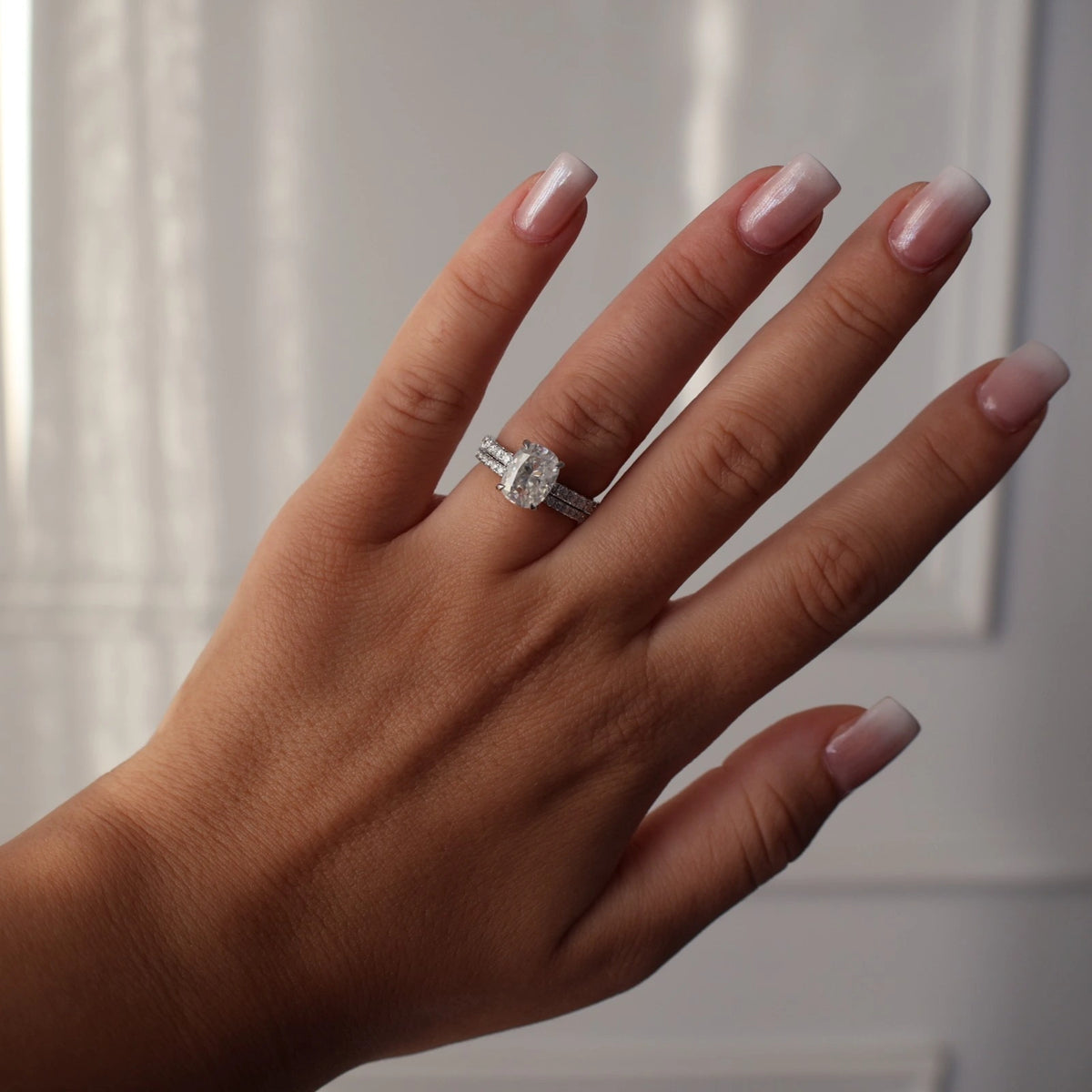 3 carat silver elongated cushion moissanite engagement ring with hidden halo