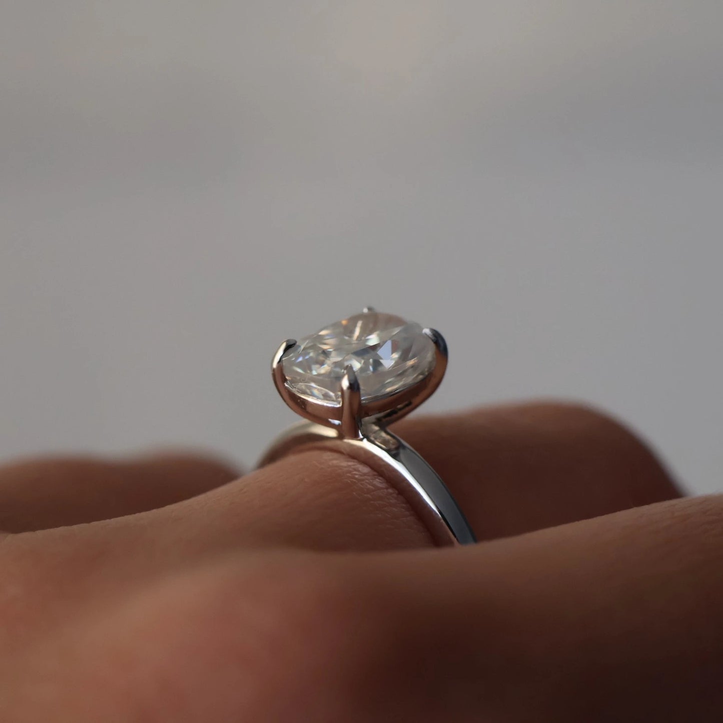 Close up of 3ct elongated cushion moissanite silver ring