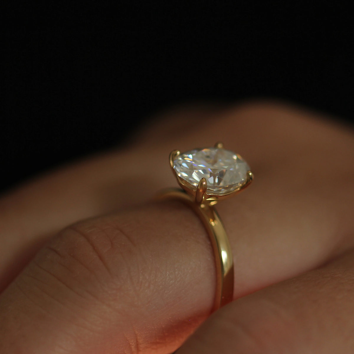 top view of 3 carat elongated oval moissanite ring in 14k gold filled