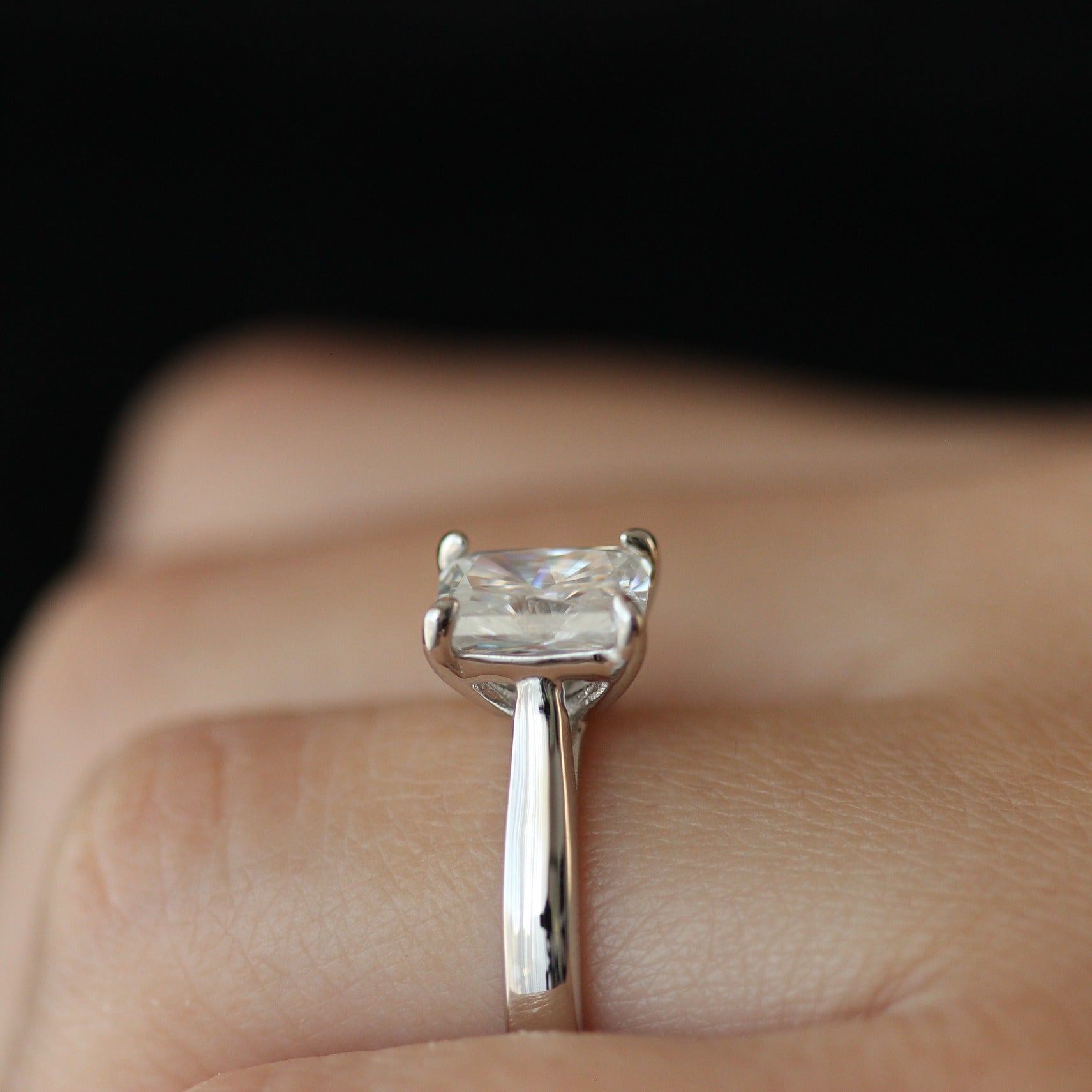 Side view of 2ct radiant moissanite ring
