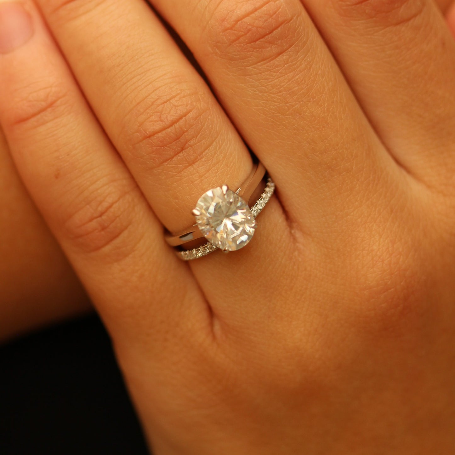 Oval moissanite ring and pave band