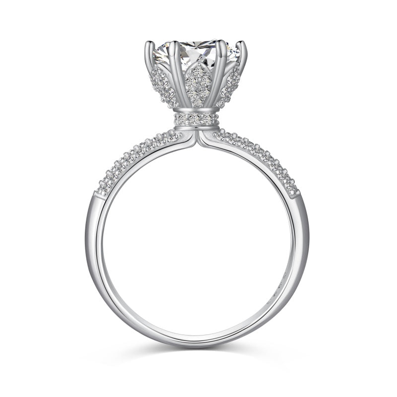 round stone on silver band with tiny cz stones on it