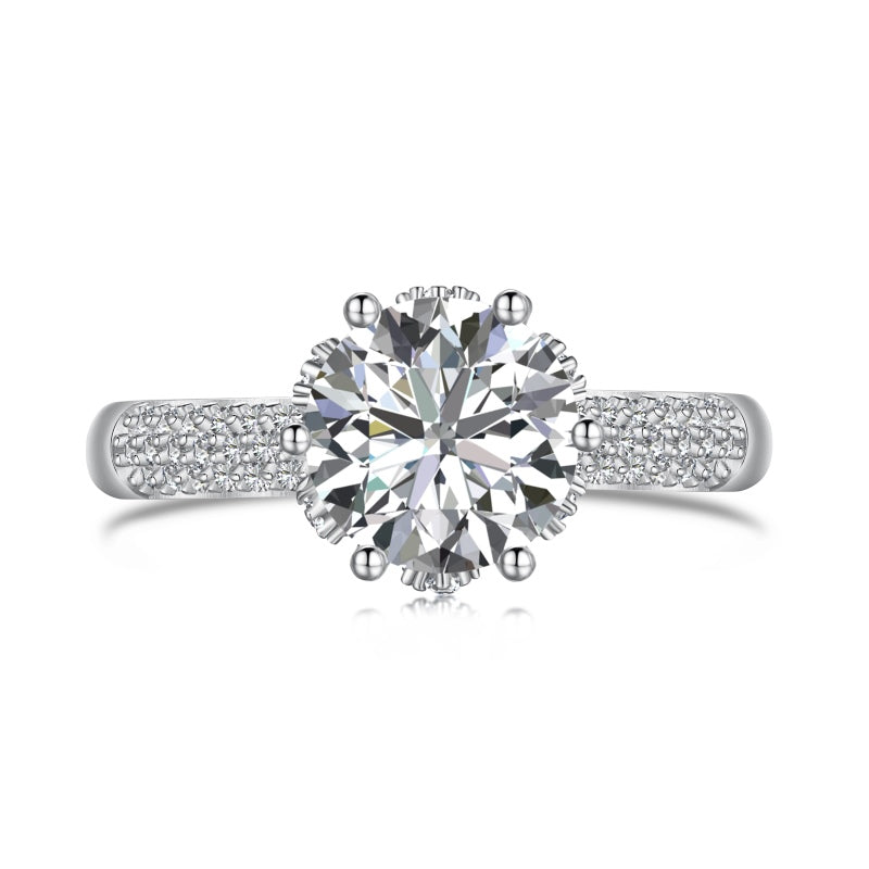 round stone on silver band with tiny cz stones on it