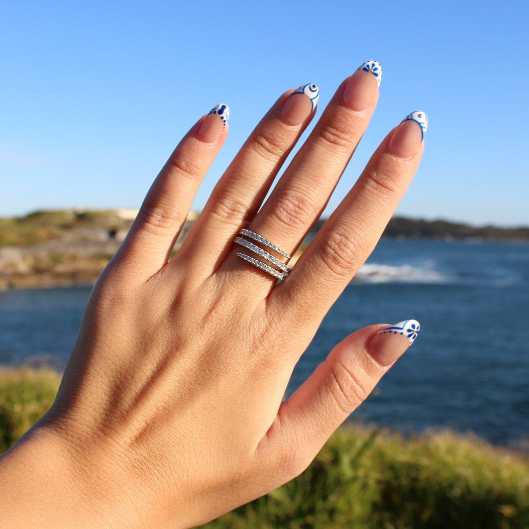 Cairo spiral ring on hand at La Perouse Beach, Sydney