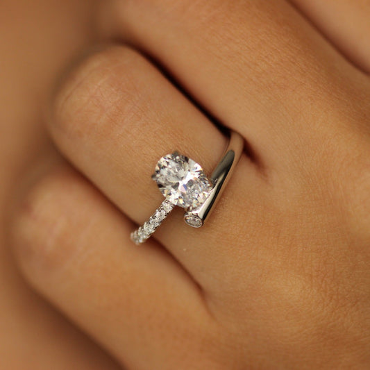 Oval silver cubic zirconia ring on hand