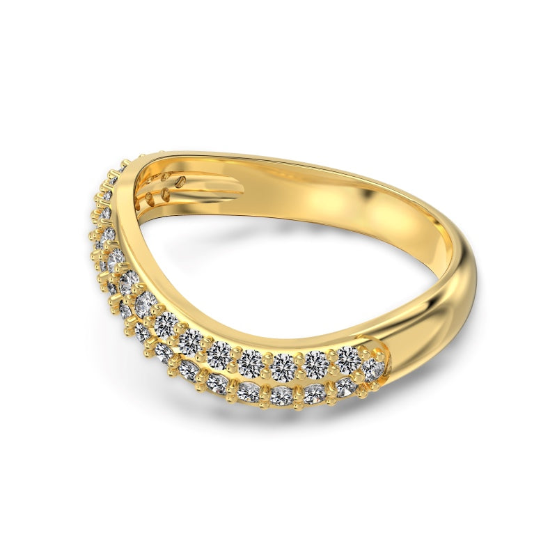 curved pave gold ring on white from top view