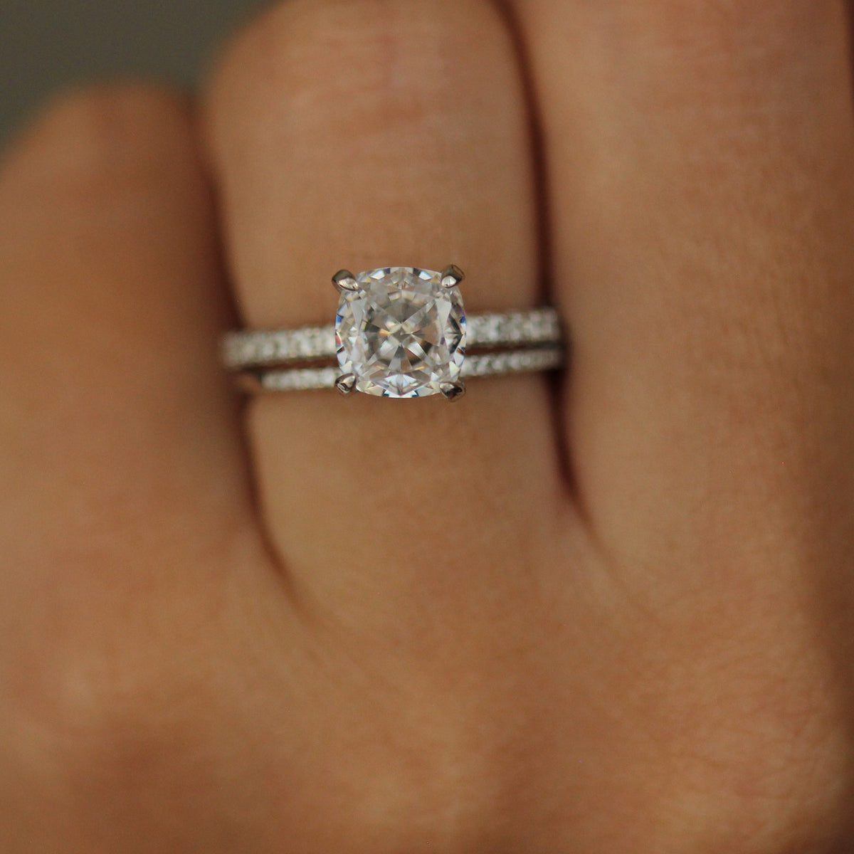 Florence Cushion Ring on hand with 1mm pave band
