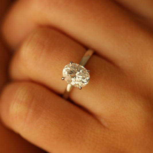 2ct oval moissanite ring on hand
