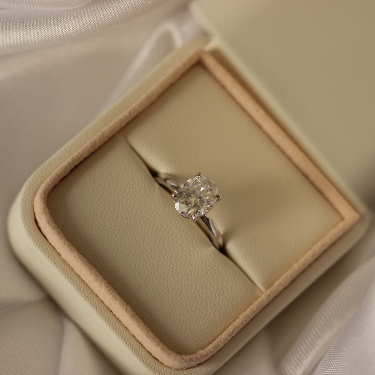 2 carat oval moissanite ring in proposal ring box