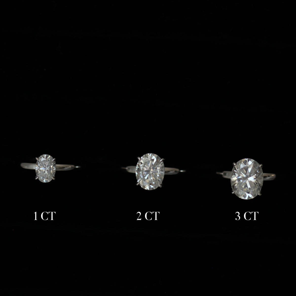 Three oval moissanite rings in different carat sizes comparison shot