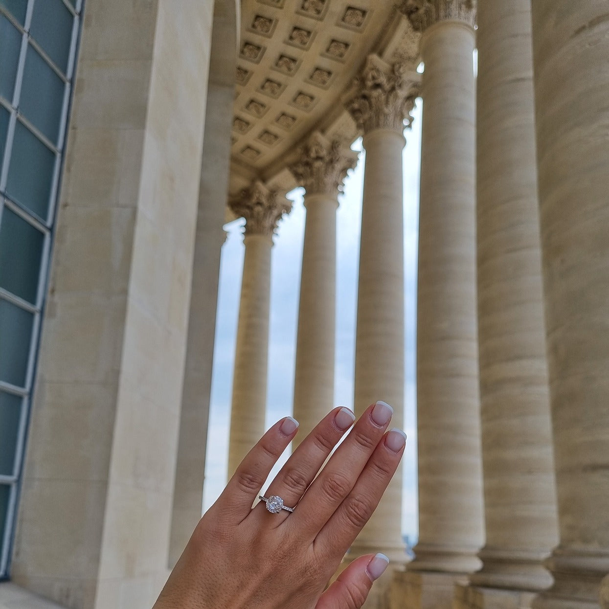 Round cut ring on hand in Pantheon Paris