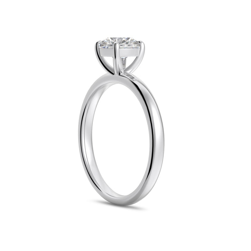 side profile madeira 1 ct round cut ring in silver on plaine white background