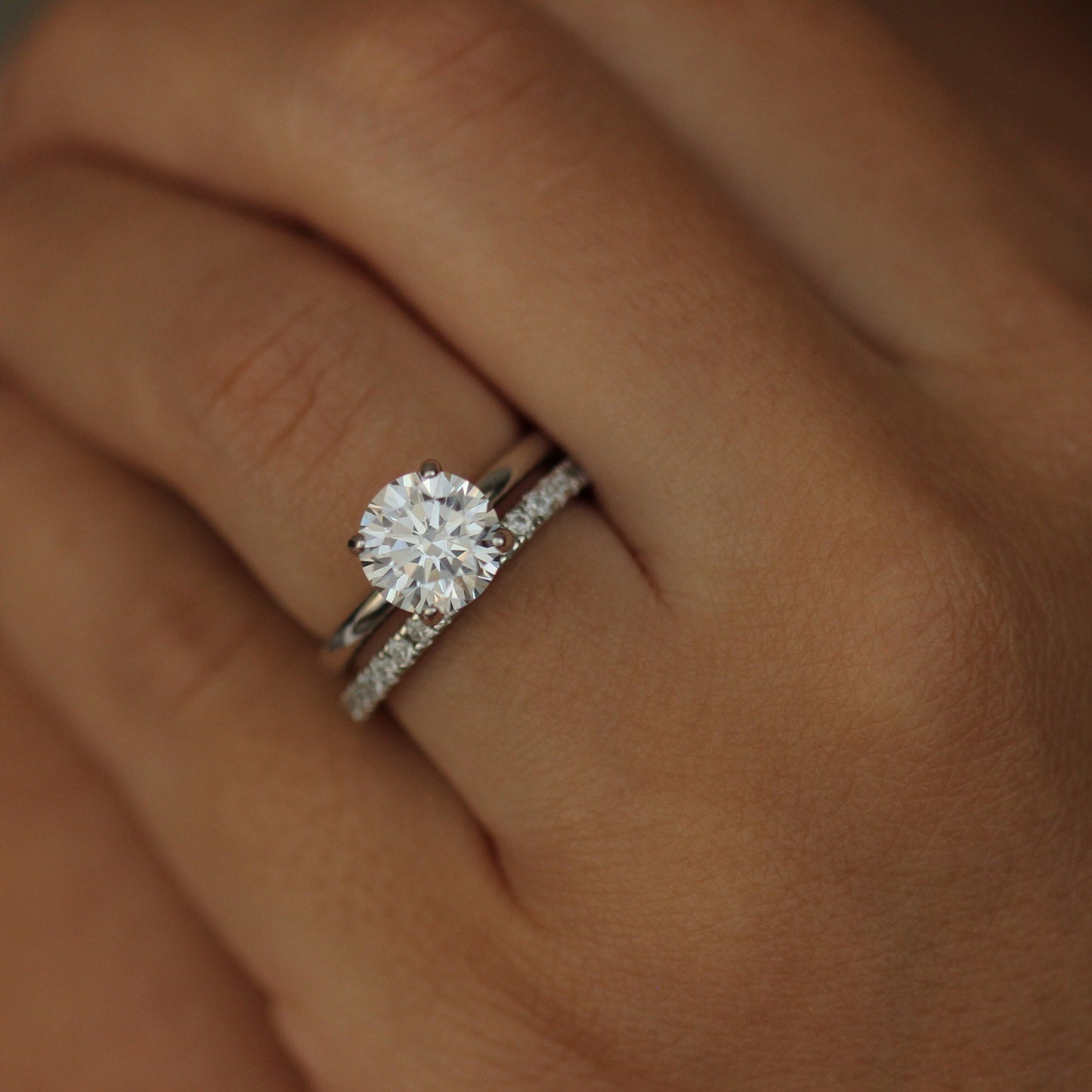 Madeira 2 Ct Round Cut Ring with pave wedding band on hand