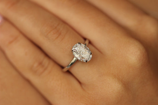 Silver oval ring on hand