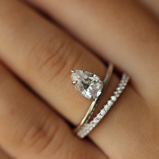 Pear silver ring on hand