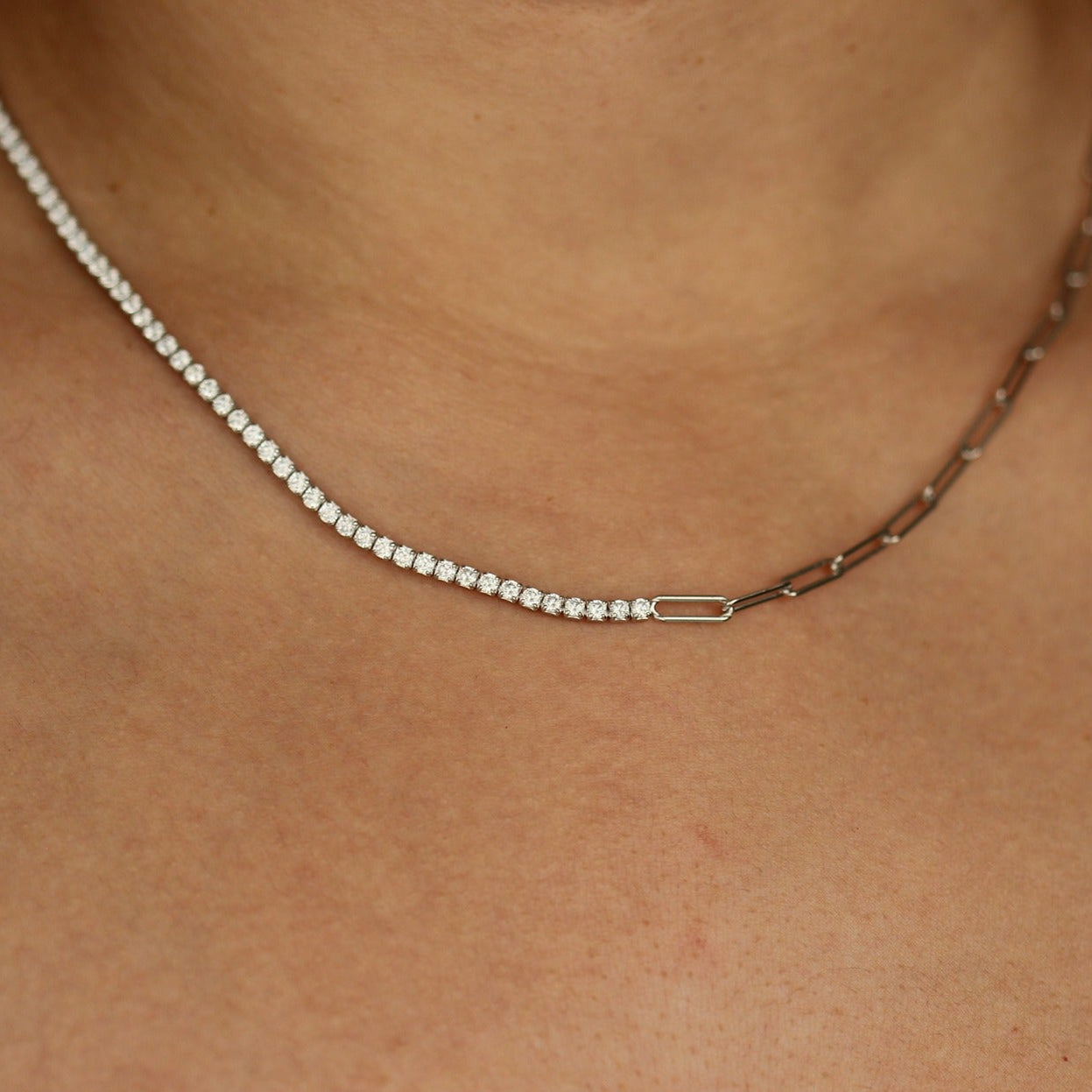 Silver tennis necklace on model