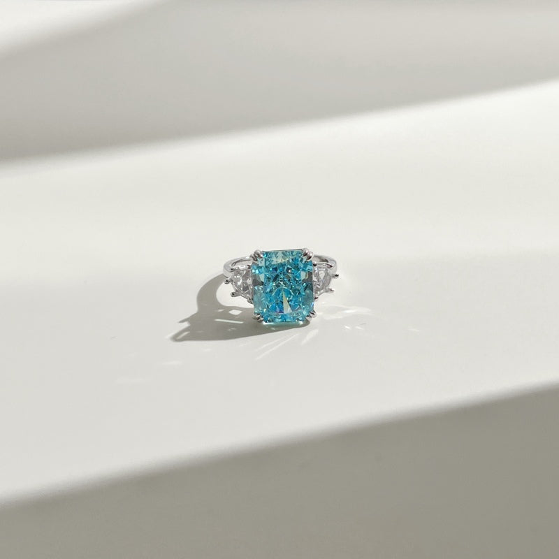 cubic zirconia ring with blue rectangle ston