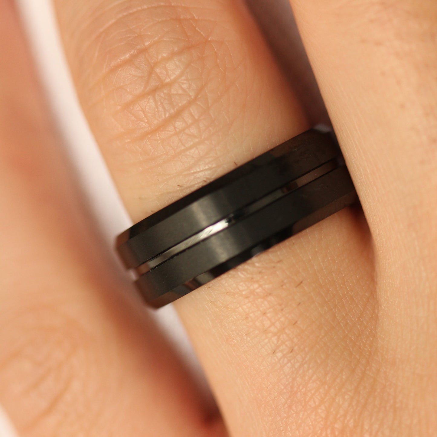 black men's ring on hand