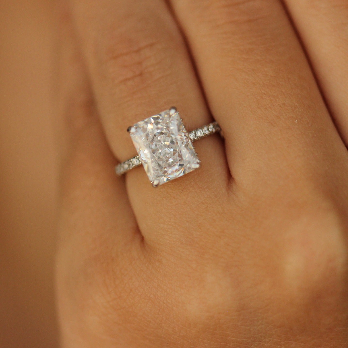 Rectangle radiant ring on hand