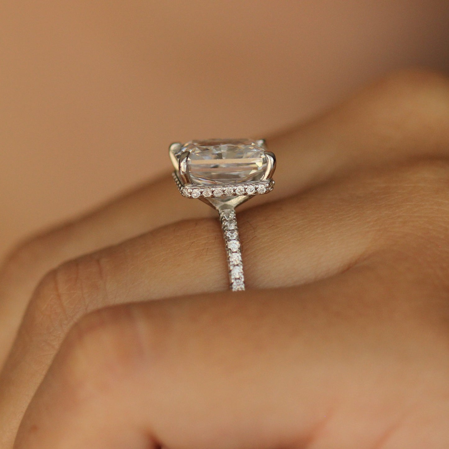 Rectangle radiant ring on hand