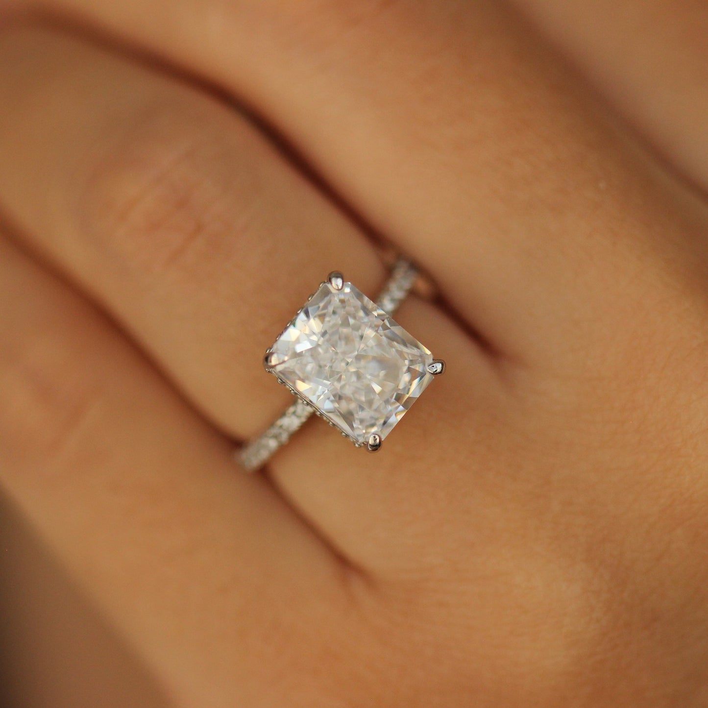 Rectangle radiant ring on hand
