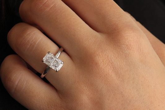 3 carat rectangle stone on sleek 925 silver band