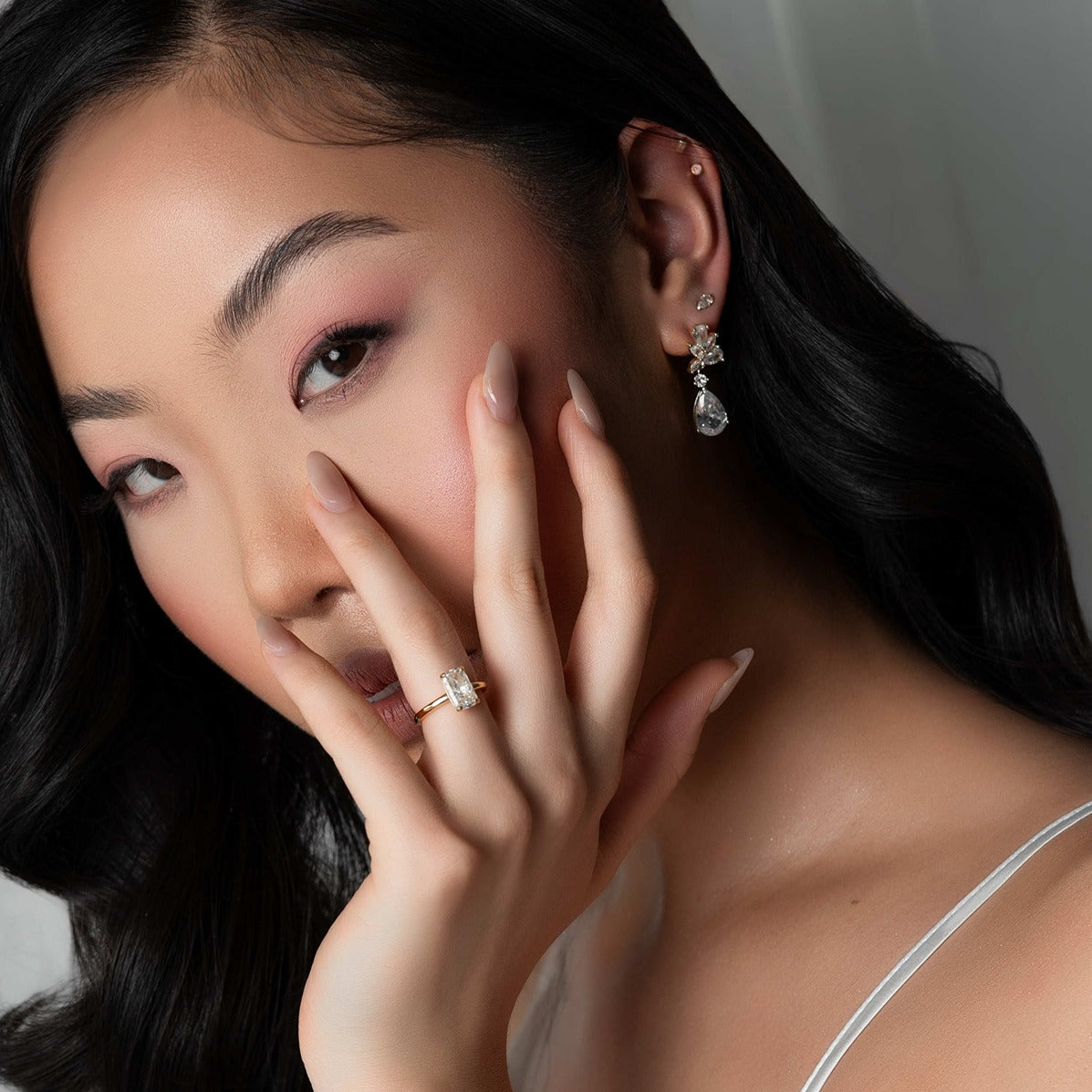 Travel Ring Co Main Banner Model Posing Gold Rectangle Ring