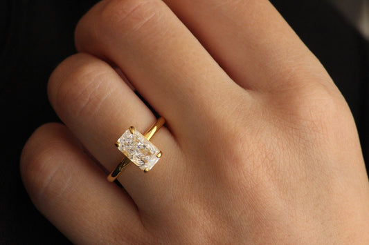 18k plated gold ring with rectangle centre stone