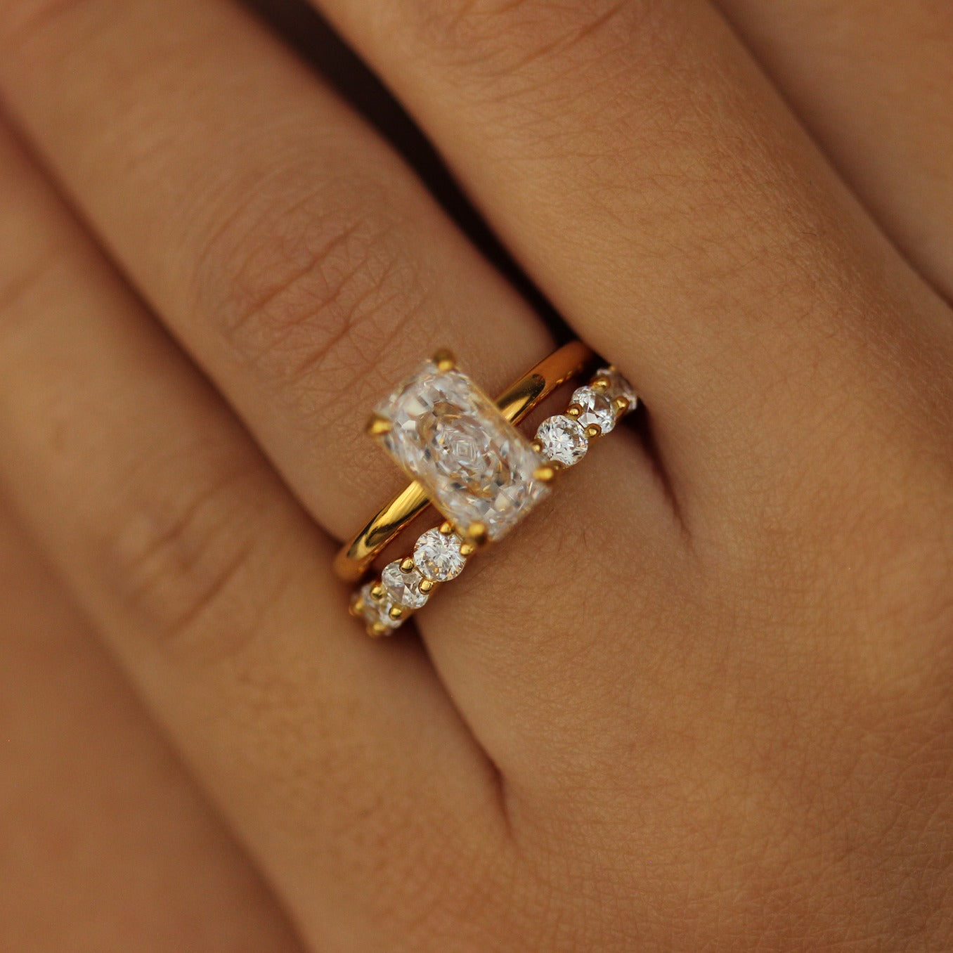 18k gold vermeil ring on hand with stacking ring