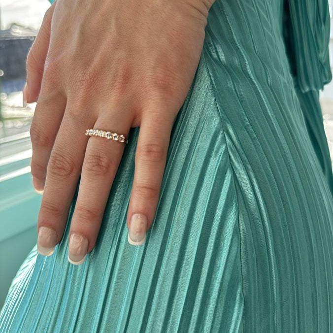 Champagne gold stacker ring with 7 stones on the band