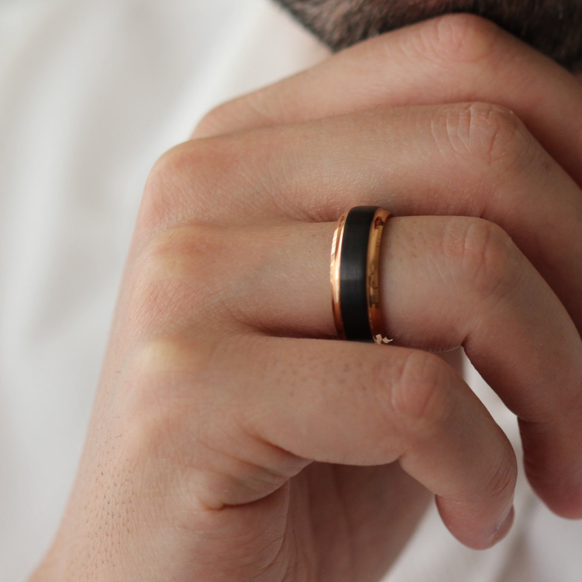 black and rose gold stepped edge mens ring