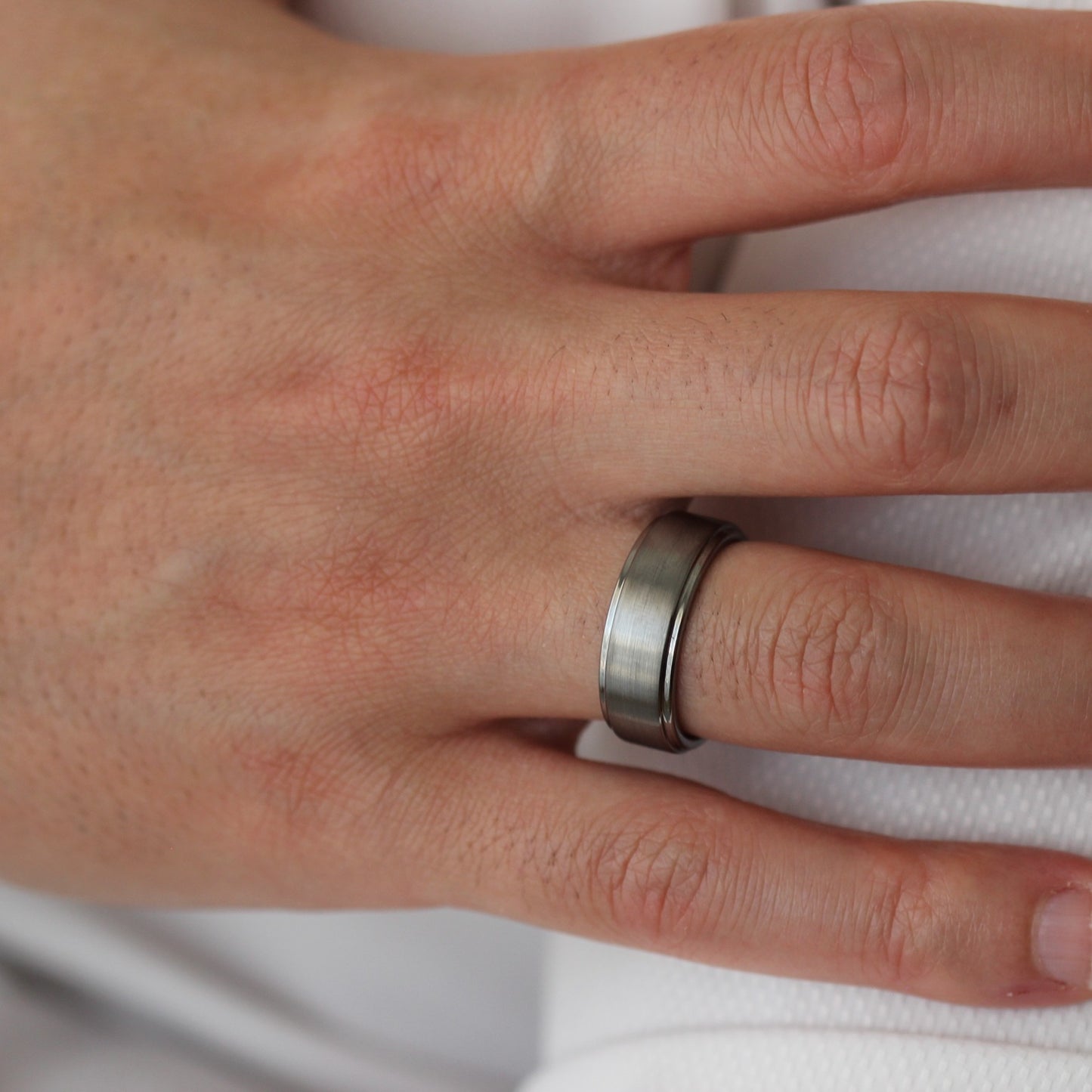 brushed silver men's ring with stepped edges