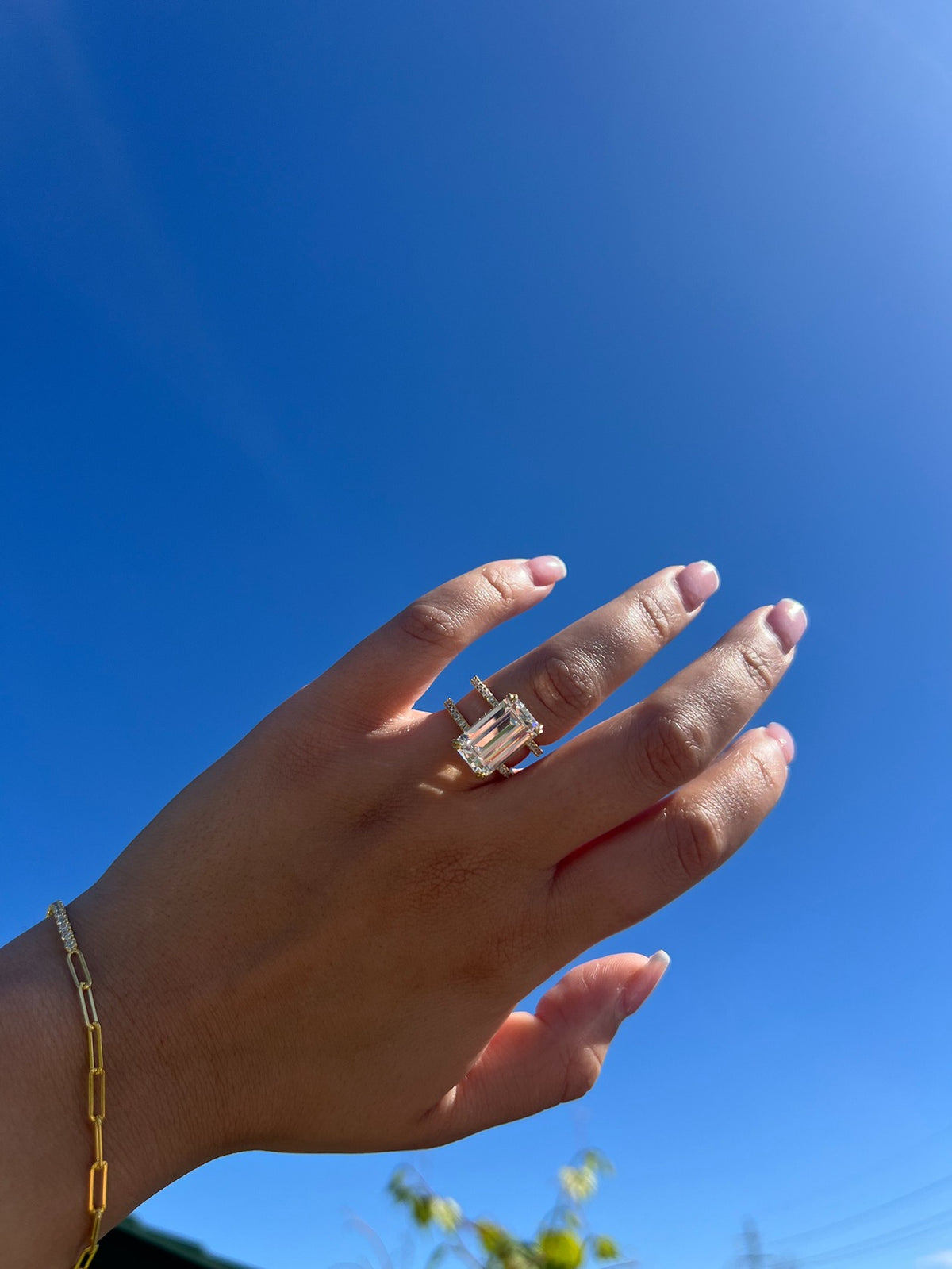 Gold emerald ring with two bands