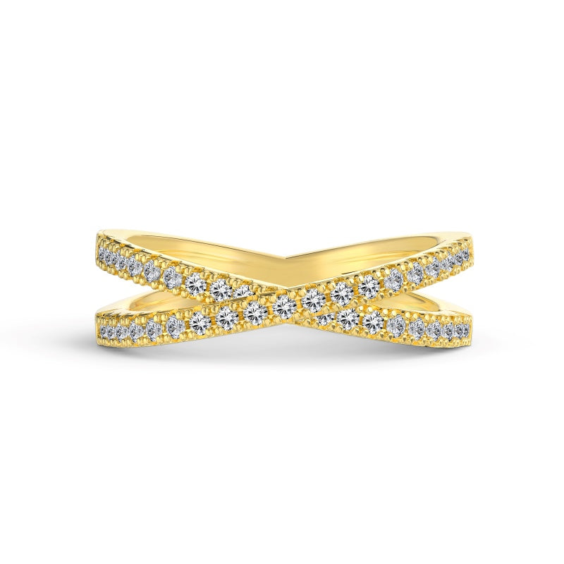 Criss cross gold ring with round cz stones on white background