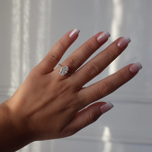 3.5 carat crushed ice oval ring in 14k gold with pavé band