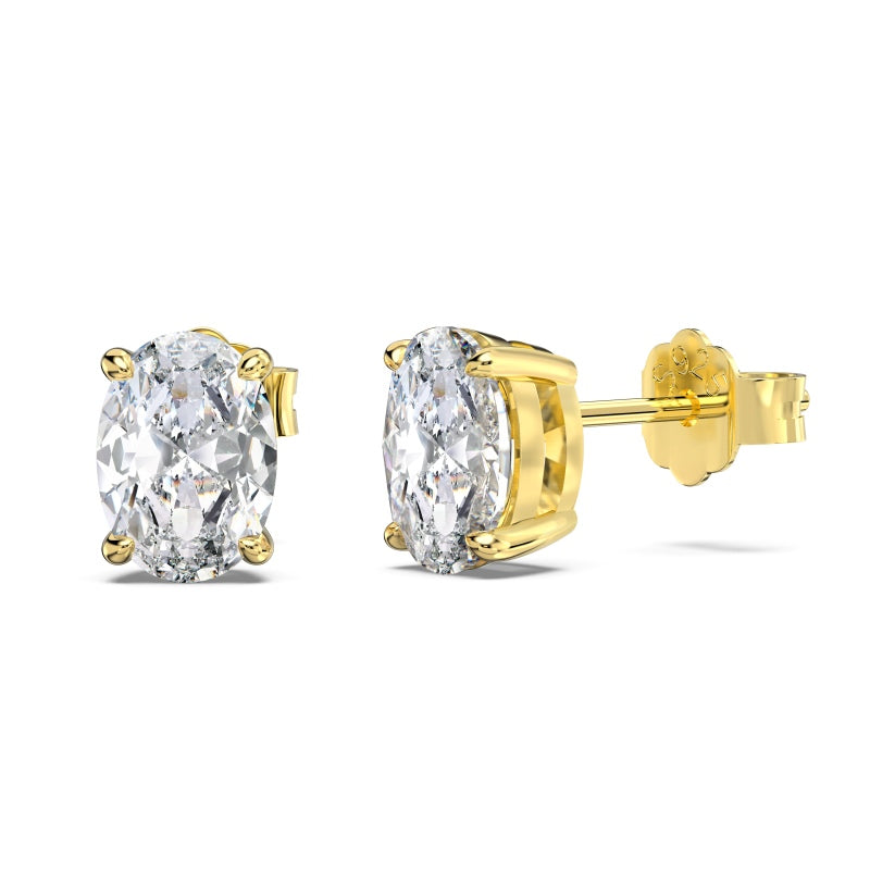 cubic zirconia gold oval stud earrings on plain white background side view