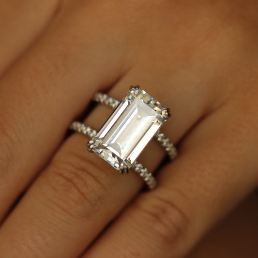 double row emerald ring in silver on hand