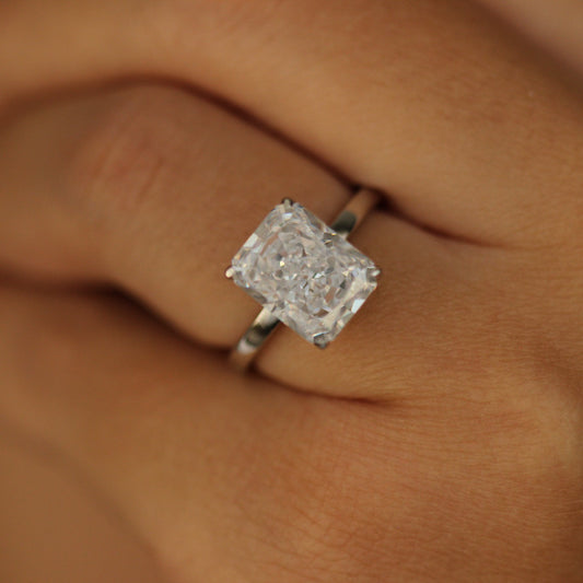 dubai radiant cut engagement ring on hand