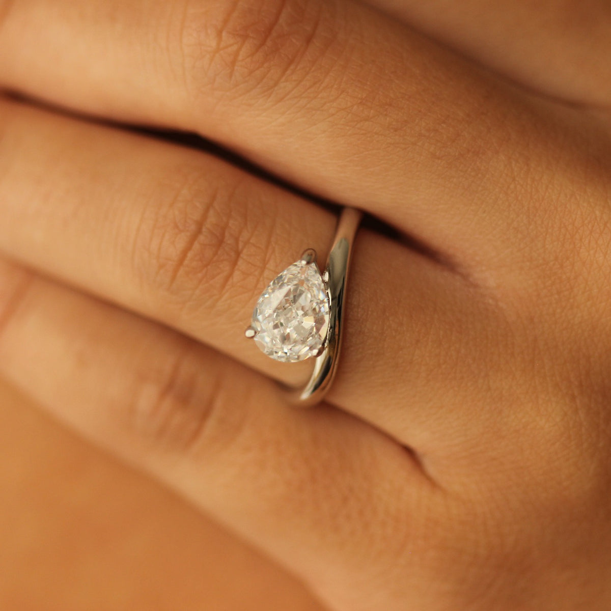 East West Curved Pear Engagement Ring in Silver with a 2.5ct pear shaped stone